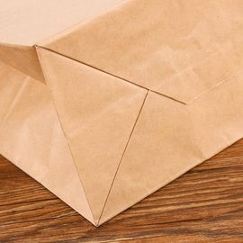 習慣によって印刷されるクラフトの紙袋環境に優しく平らな手ロープ サプライヤー